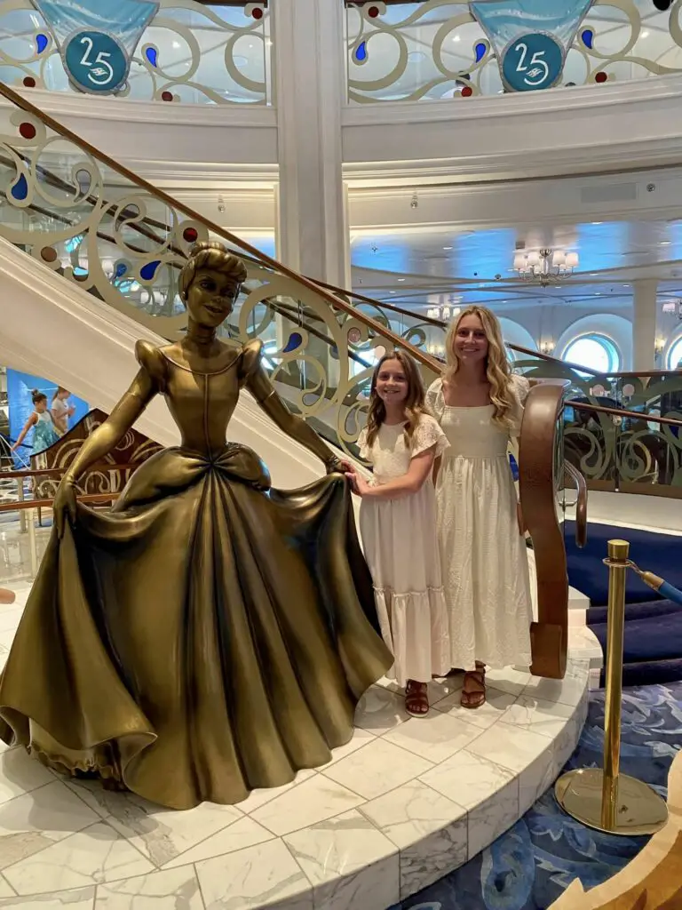 Cinderella statue in the atrium of The Disney Wish