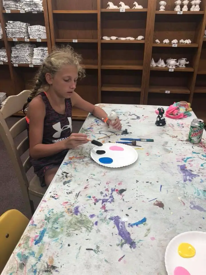 painting ceramics at the activity center at Jellystone Park